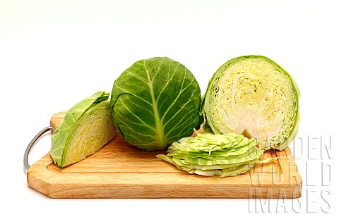 Sliced_head_of_cabbage_on_a_cutting_board_on_a_light_background_Natural_product_Natural_color_Closeu