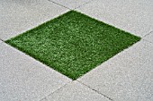 ARTIFICIAL GRASS TILE WITH STONE TILES