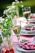 SUMMER TABLE DECORATED WITH HERBS - CHAMOMILE AND MINT