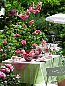 GARDEN TABLE EMBELLISHED WITH ROSES