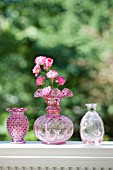 ROSA THE LOVELY FAIRY IN CRANBERRY GLASS VASE