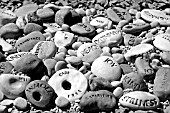 DECORATIVE STONES WITH MESSAGES IN BLACK AND WHITE