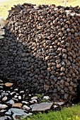 PILE OF PEAT DRYING IN IRELAND