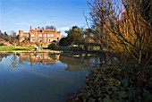 THE LAKE AND GARDENS AT HODSOCK PRIORY IN LATE WINTER