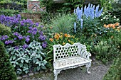 WHITE METAL BENCH AND BORDERS AT WOLLERTON OLD HALL