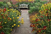 HOT BORDER WITH WOODEN BENCH AT WOLLERTON OLD HALL