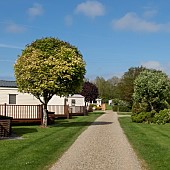 Static caravan park with exclusively privately owned holiday homes set among trees, shrubs and flowers and sweeping well manicured lawns the park is situated minutes from the seaside resorts of Ceredigion