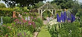Deep borders of mixed colours and varieties of herbaceous perennials