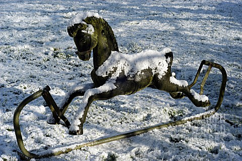 SNOW_ON_ROCKING_HORSE_IN_GARDEN