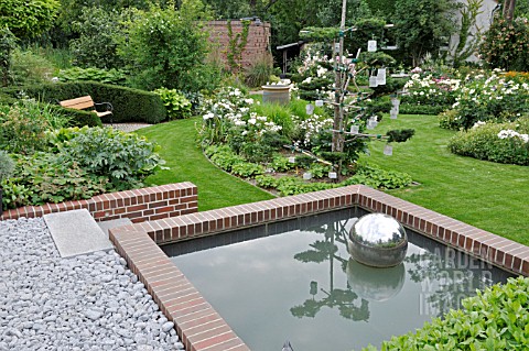 WATER_BASIN_AT_THE_EDGE_OF_A_ROSE_GARDEN