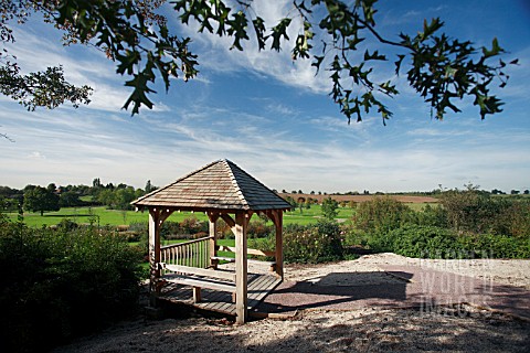 ONE_OF_THE__PERGOLAS_AND_A_VIEW_OF_PART_OF_THE_GARDEN_AT_HYDE_HALL__NEAR_CHELMSFORD