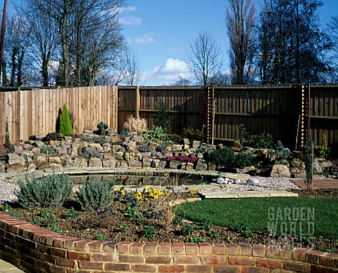 NEW_GARDEN_IN_DEVELOPMENT_1_FEBRUARY_WINTER_VIEW_ACROSS_THE_GARDEN_TO_POND_AND_ROCKERY